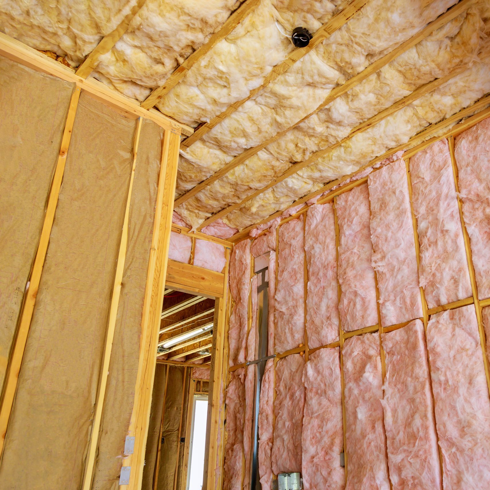 batt insulation materials at house construction walls
